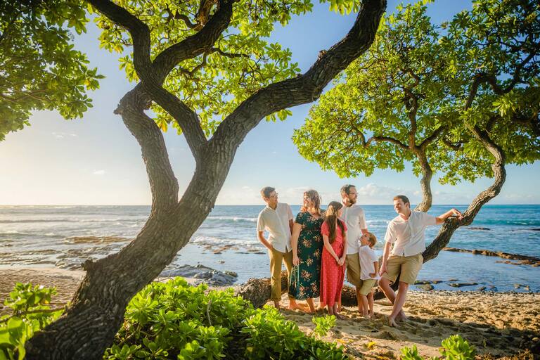 A family on a beach in Hawaii