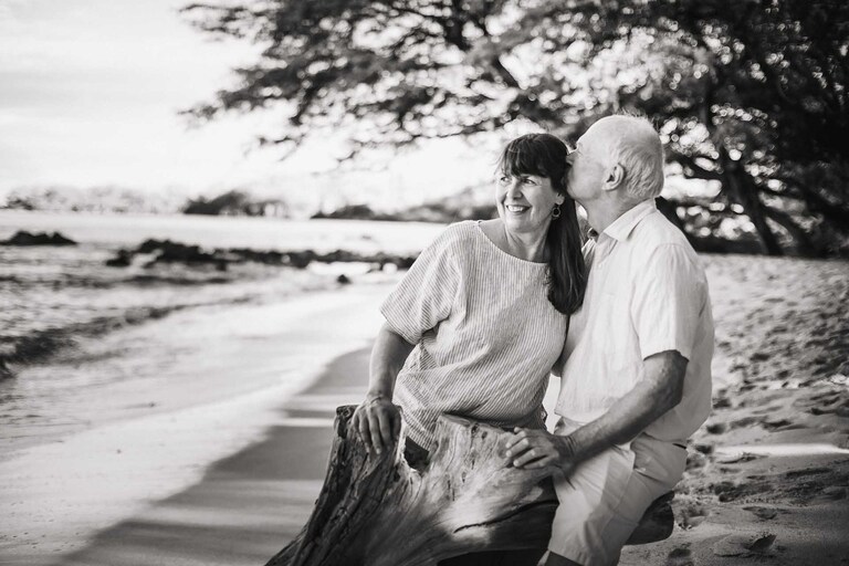A retired couple enjoying the beach in Hawaii.